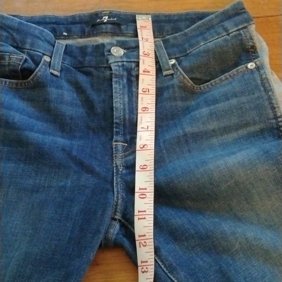 Size 28 7 for all Mankind jeans.Lighter denim stripe down sides. Frayed hems. - Picture 10 of 15